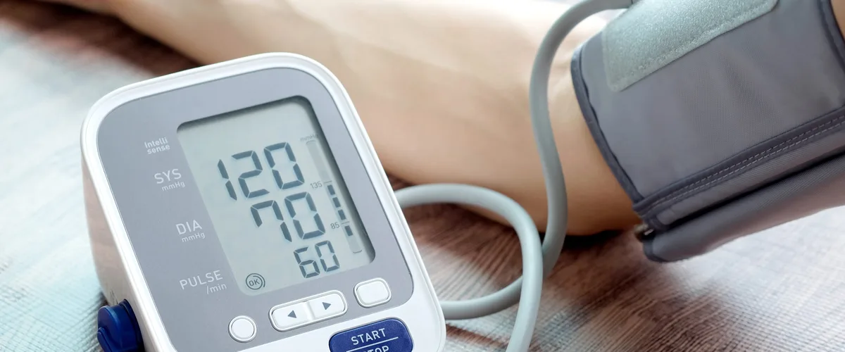 Flinders Discount Chemist | Free Blood Pressure Testing in Flinders Digital upper-arm blood pressure monitor with cuff showing a reading on its screen